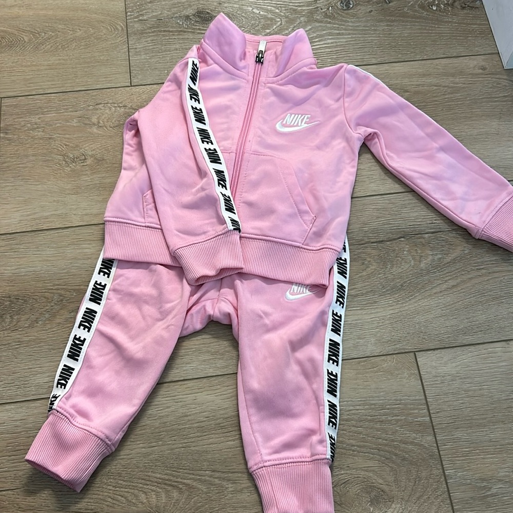 Pink Nike track suit